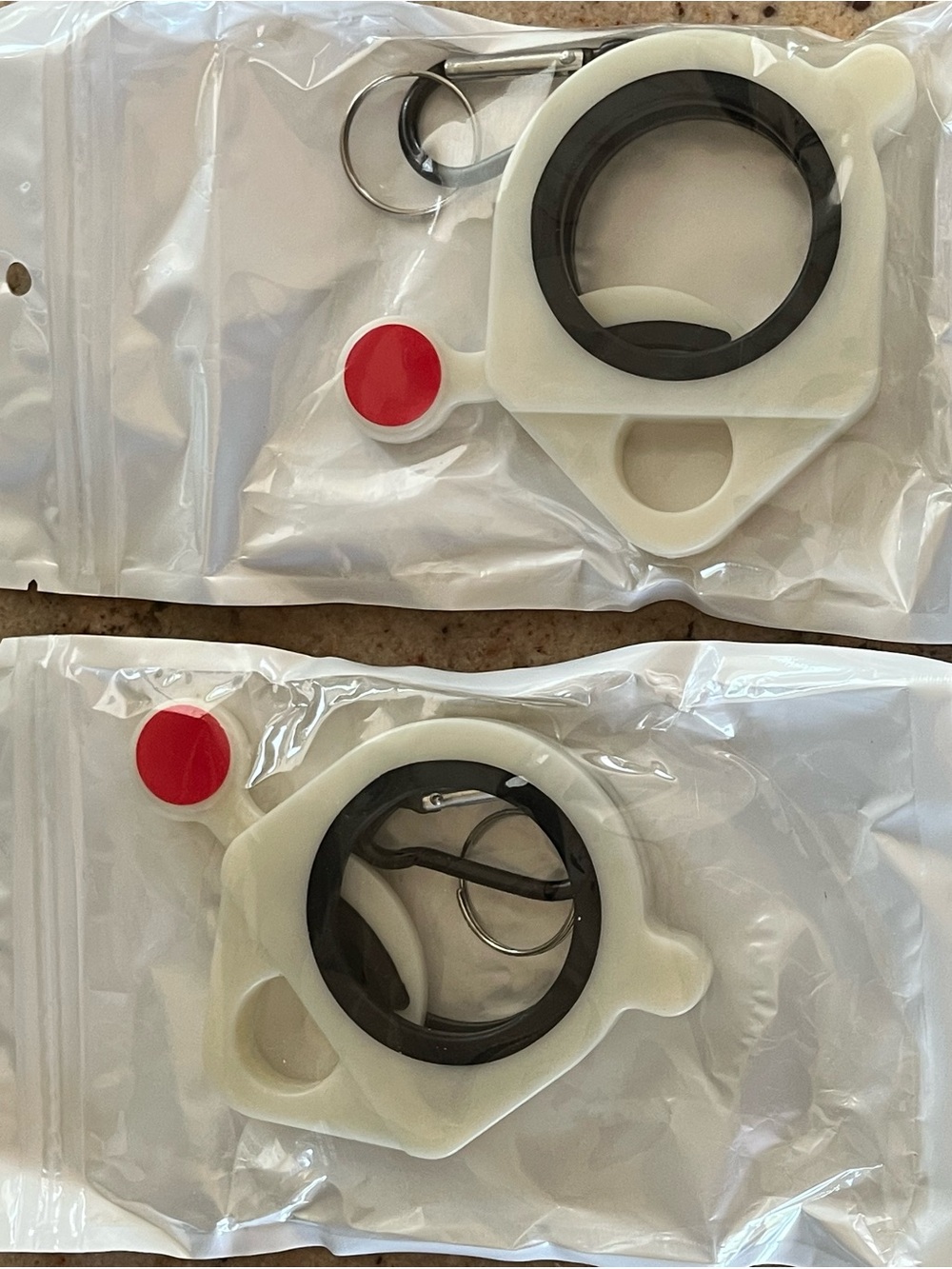 White and Black Lens Keychain Holder with Red Accent